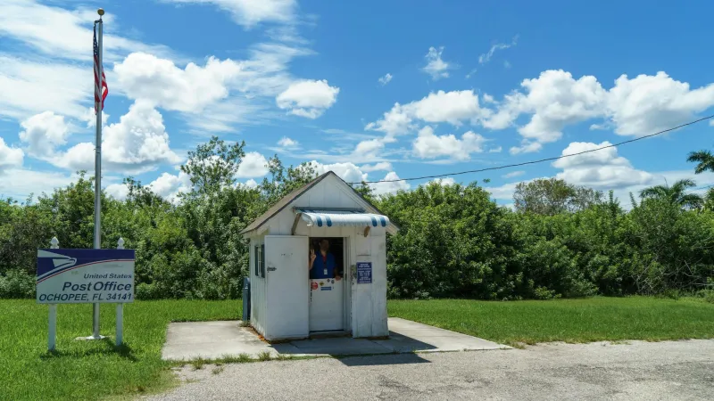When Your Local Post Office Was Actually a Bank — The Government Program That Banked Millions Until Private Banks Killed It